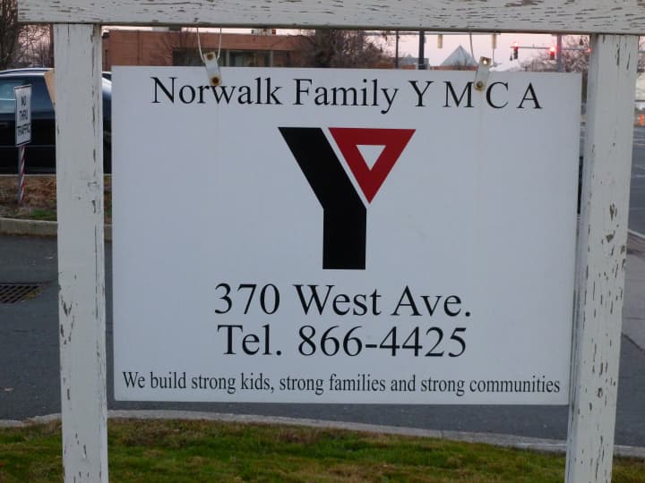 The Norwalk YMCA is transferring its lease with the city for an adjacent parking lot to Norwalk Hospital, which is planning to buy the Y&#x27;s West Avenue building.