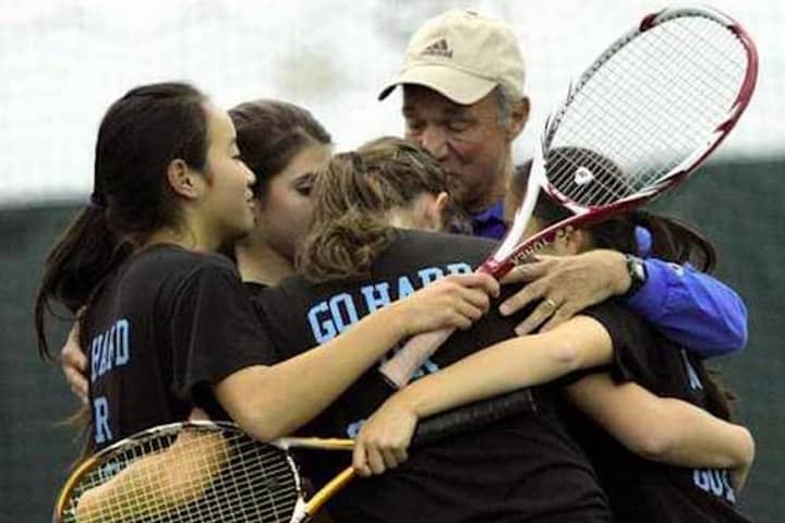 Coach Jim San Marco embraces his Edgemont tennis players at the state tournament in 2011, San Marco&#x27;s last year of coaching before retirement.