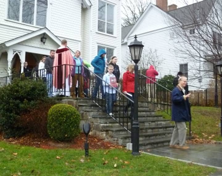 Parishioners exit St. Mary of the Assumption Church after a Sunday Mass in Katonah. One of the teachers killed in Friday&#x27;s shooting at a Newtown, Conn. elementary school was a Katonah native and her parents are parishioners at the church.