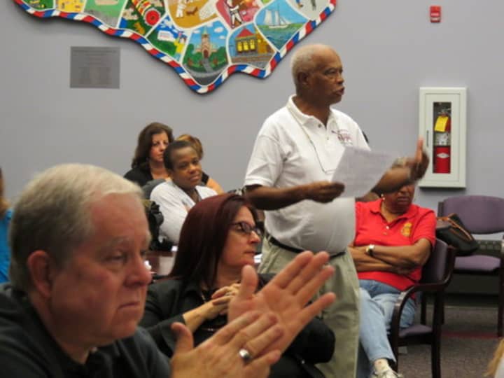 A Port Chester resident speaks up at a town hall-style meeting Sept. 27 about quality of life in Port Chester.