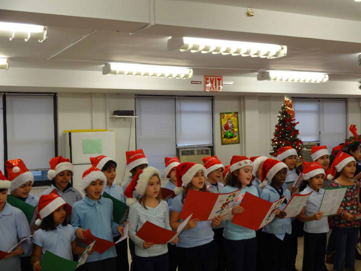 Students from Yonkers Montessori School 31 caroled Tuesday for senior citizens to help spread holiday cheer before Christmas.