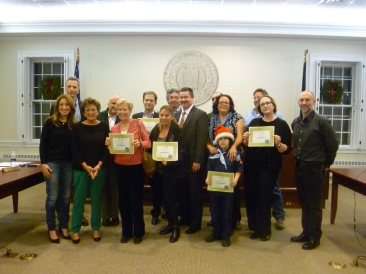 At the Bedford board meeting Tuesday, Energize Bedford joined with the town to honor the 13 families who recently completed energy saving retrofits in their homes.