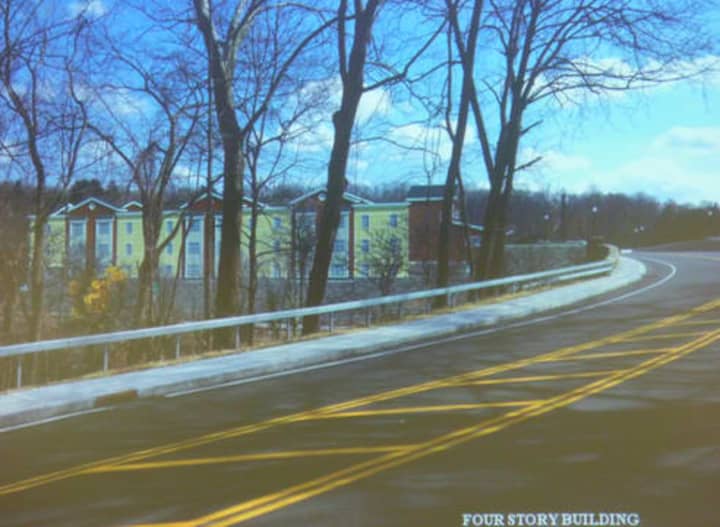 A rendering of the proposed four-story Chappaqua Station affordable housing development as seen from Quaker Road.