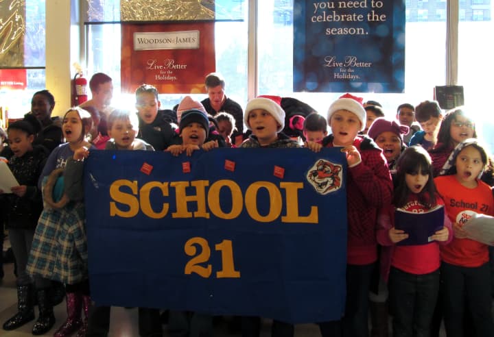 Students from Yonkers School 21 marched several blocks from their school to a local supermarket to sing holiday songs the week before Christmas.