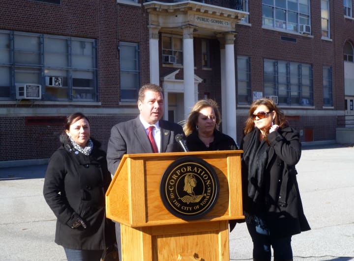 Mayor Mike Spano and members of the Yonkers Council of PTA/PTSAs announced the start of the &quot;Pledge For Healthy School Bus Stops&quot; campaign Wednesday outside School 13 . 