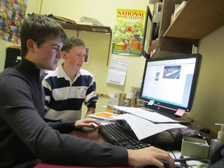 Briarcliff High School seniors Tyler Friedman, left, and Jack Fischer edit the online version of the school&#x27;s newspaper, the Briarcliff Bulletin. 