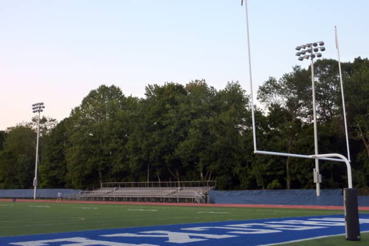 Permanent field lights are installed at Westport&#x27;s Staples High School in July.
