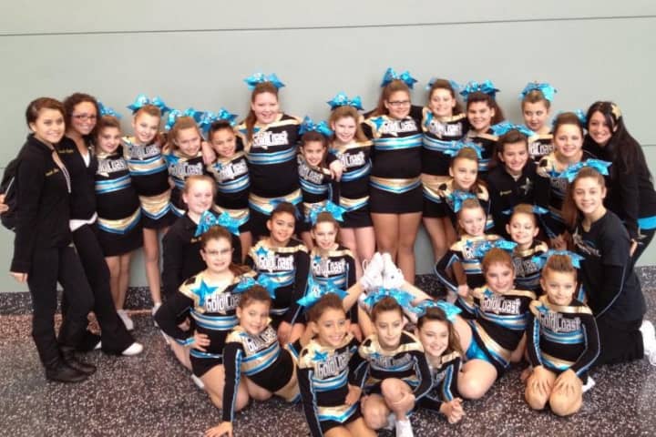 The Stamford-based Gold Coast All-Star cheerleading Whirlwind team won grand champion honors in its first contest of the season.
