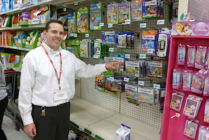 Greenburgh Kmart manager Scott Reid points to LeapPad games, which he says are very popular this year.