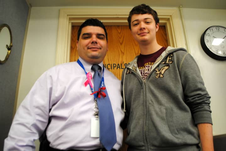 Hen Hud senior Kevin Kiley, right, has won recognition for his achievement in Italian language studies. At left is James Mackin, principal of Hendrick Hudson High School.