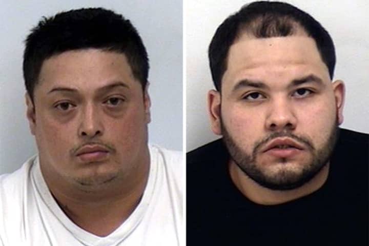 Bronx resident Oswaldo Ponce, left, and Javier Camillo were arrested by Westport Friday afternoon and charged with having fraudulent credit cards.