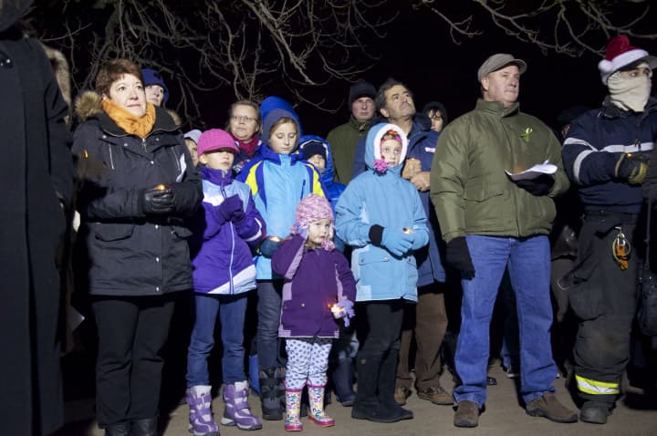 Members of the Mamaroneck community bear the cold Friday to remember victims of the Sandy Hook Elementary School shooting.