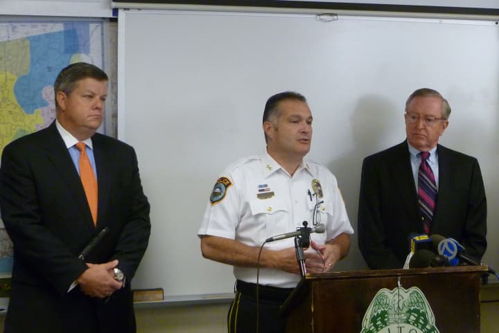 Wilton Police Chief Michael Lombardo, left, speaks during an August press conference to announce the arrest of a juvenile in connection with the 2008 death of 13-year-old Nicholas Parisot. 