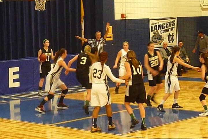Victoria Shea looks to make an inbounds pass for Joel Barlow.