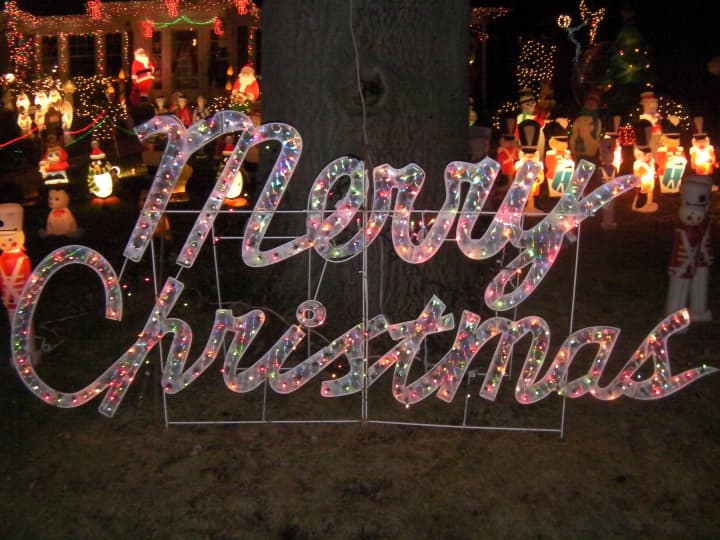 Residents adorn their lawn with Christmas lights and decorations. 