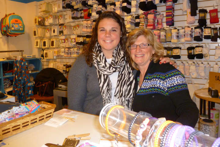Holiday business was good for Candy Nichols children&#x27;s clothing store and shop co-owner Anna Carberry, right. She is pictured with sales associate Jennifer Joseph. 
