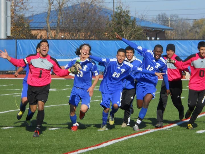 The Port Chester boys soccer team was all smiles after winning its state semifinal game over Fowler.