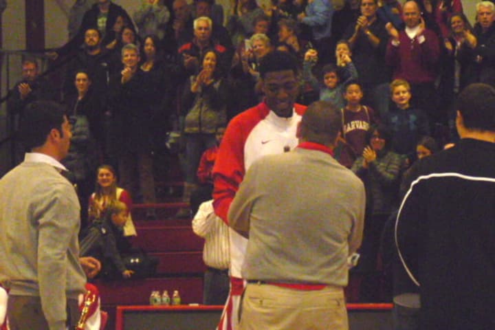 Fairfield Prep&#x27;s Pascal Chukwu accepts the tournament MVP award after leading the Jesuits to the title Friday over Notre Dame of Fairfield.