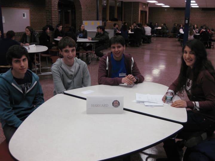 Horace Greeley juniors Joao Carrvao, left, Max Smiley and Josh Turner sit down with Horace Greeley graduate Aemilia Phillips, who now is a freshman at Harvard.