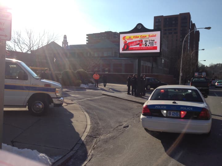 Police block the entrance to the White Plains Public Library parking garage Friday afternoon.