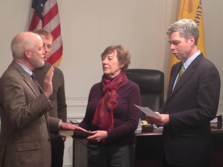 John Kirkpatrick (left) is sworn in as the newest member of the White Plains Common Council Monday night. 