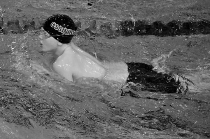 Spartan Alex Carrazzone in his breaststroke race.