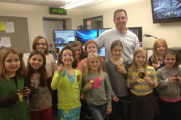 Brownies from Ox Ridge Elementary toured the newly-built Darien Police Department.