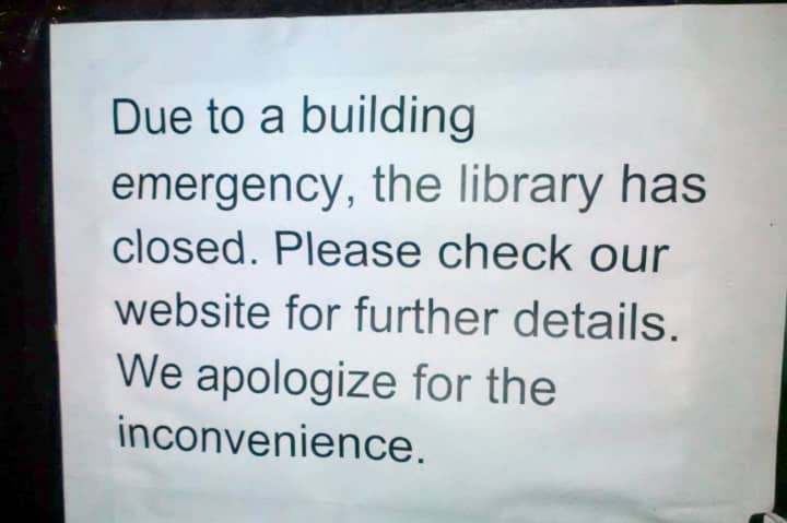 A sign on the doors of the Mount Vernon Public Library tells the public of the emergency closing Wednesday.