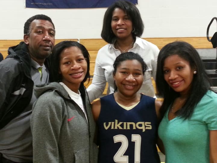 Norwalk&#x27;s Brown family of (back row) Tyrone and Carol and (front, left to right) Briana, Tatiana and Elisa have set an impressive high school basketball scoring standard.