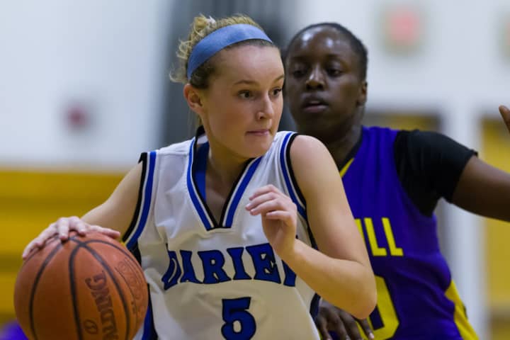 Darien&#x27;s Emily Stein driving on an opponent during a game earlier this season. 