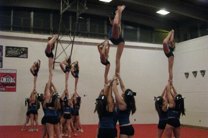 A team from Norwalk-based Xtreme Cheer practices in preparation for the upcoming season.