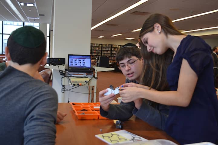 Solomon Schechter students work on a science project. The Hartsdale school has seen a steady enrollment of students despite rising tuition.