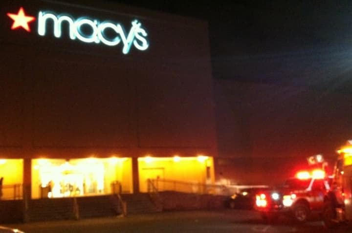 Yonkers firefighters respond Saturday night to a reported fire in Macy&#x27;s at the Cross County Mall.