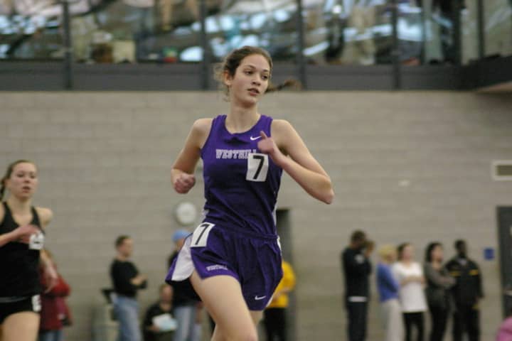 Westhill High senior Claire Howlett sets a school record and wins her heat in the 3,000 meters Saturday at the Yale Invitational.