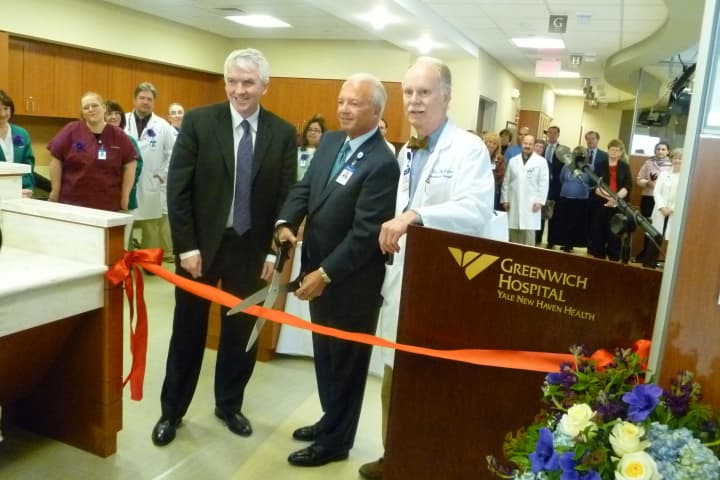 From left to right, Dr. Thomas Lynch Jr., Frank Corvino and Dr. Dickerman Hollister Jr. open the renovated Bendheim Cancer Center.