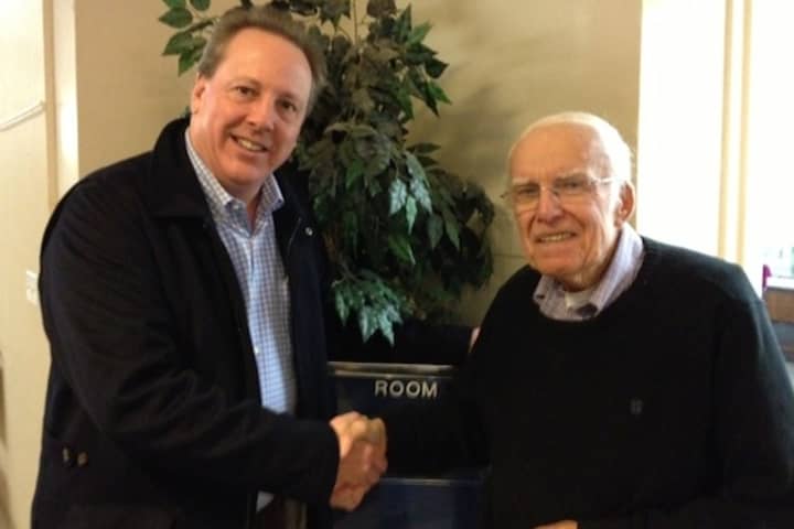 Darien Republican Town Committee Chair Bob Bewkes thanks Registrar Don Smith for his 22 years of service.