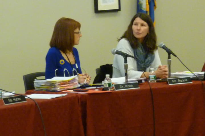 New Canaan Board of Education Chairwoman Alison Bedula, right, speaks during Monday&#x27;s school board meeting. With her is Superintendent Mary Kolek. 