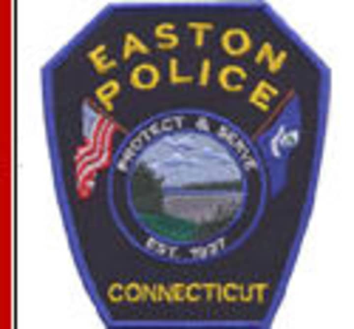 An Easton couple charged in theft of over $42,000 in utilities turned themselves in on Monday.