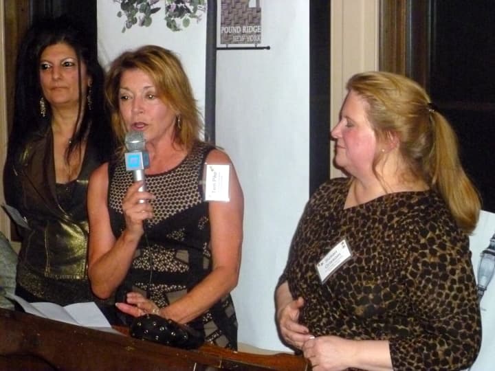 From left, Maggie Nader of the Pound Ridge Business Association, and Terry Pike and Susan Grissom of the Pound Ridge Partnership, address the crowd at the streetlight fund-raiser at the Bedford Post Inn.