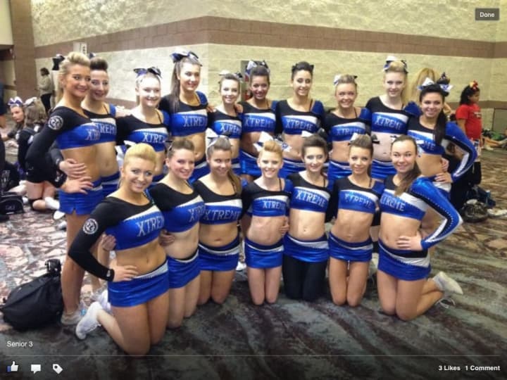 Girls from Flare, a team from Norwalk-based Xtreme Cheer, celebrate their strong performance in New Jersey. 