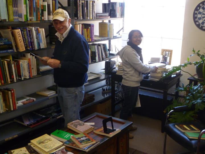Curious-on-Hudson&#x27;s Fred Dubin, left, and Sadi Rebsch do some book housekeeping in preparation for Sundays opening.
