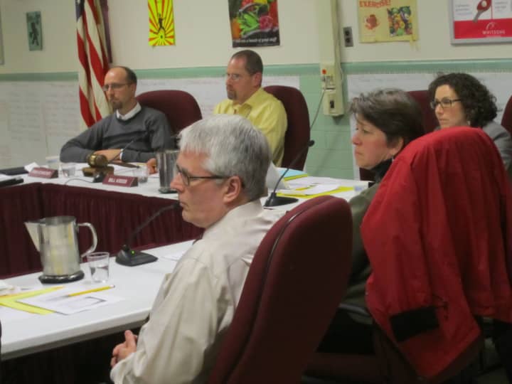 Ossining school board members listen to the public at a mini budget session Jan. 16. With the sessions concluded, the board will need to consider budget cuts. 
