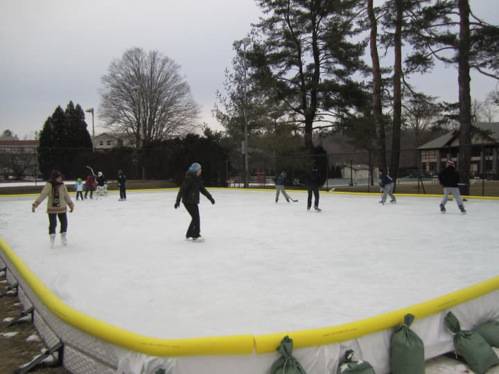 Briarcliff Manor residents skate on the newly opened ice rink at Law Memorial Park on Friday. 