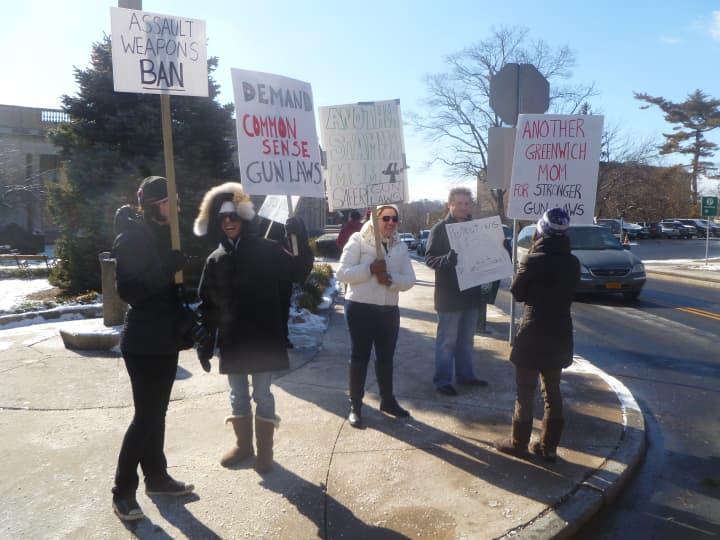 The Greenwich Council on Gun Violence staged a street protest on Greenwich Avenue to support gun control legislation.