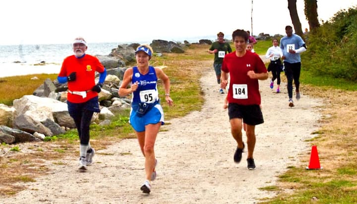 Runners compete at Susannah&#x27;s Run, part of the Greenwich Cup Series, at Tod&#x27;s Point last fall.