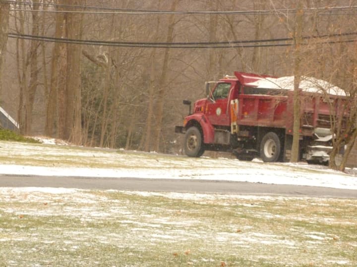 Lewisboro Highway Department salt trucks head out Monday morning in anticipation sleet and freezing rain in the afternoon.