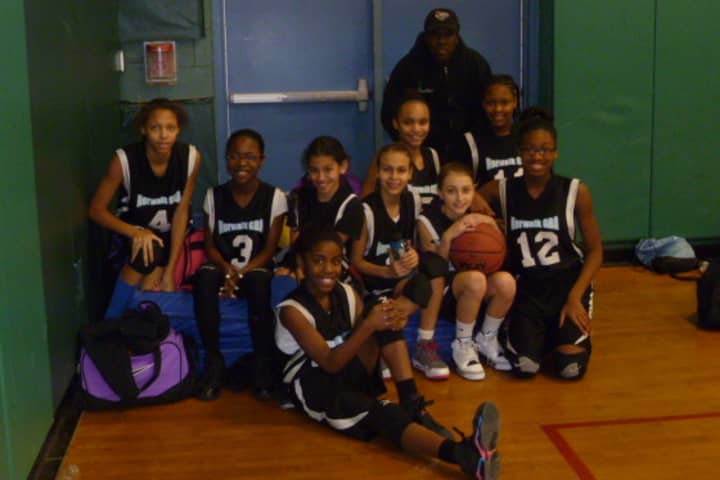 The Norwalk sixth-grade girls basketball team is 18-0 and has won three tournament championships.