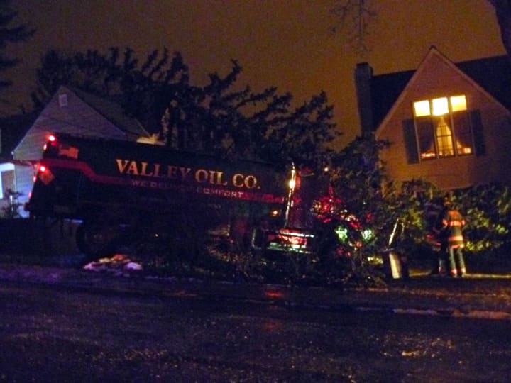 A Valley Oil truck slammed into trees in the front yard of a home at 8 Byrd Place in Yonkers on Monday evening. 
