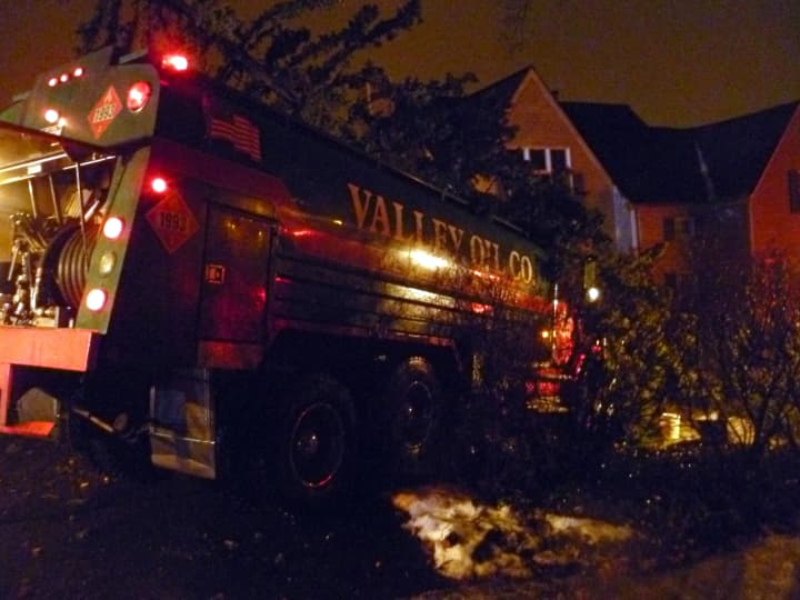 A Valley Oil Co. truck slammed into trees in the front yard of a home at 8 Byrd Place in Yonkers on Monday evening.