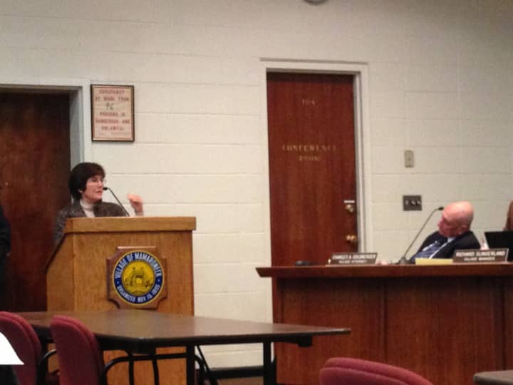 Celia Felsher addresses the Village of Mamaroneck Board of Trustees on Monday evening about plans for a Hampshire Country Club development.